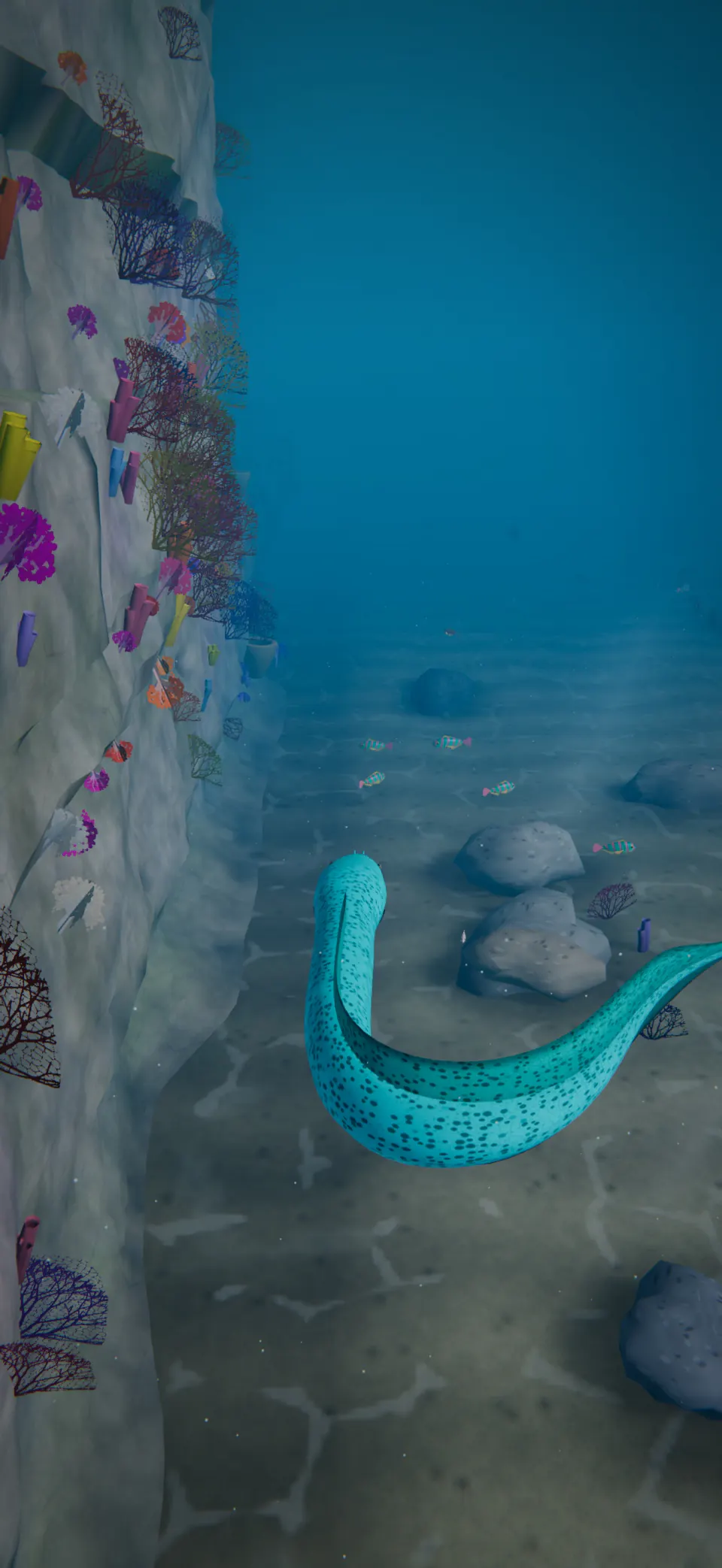 A spotted Electric Cyan eel curves through open blue water beside the coral-covered wall of Cliff Reef.