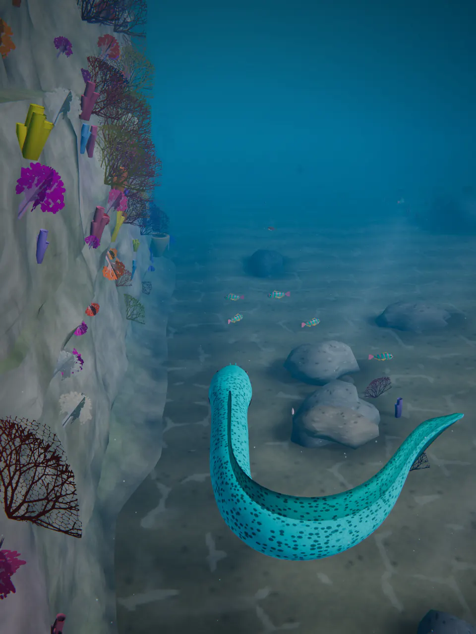 A spotted Electric Cyan eel curves through open blue water beside the coral-covered wall of Cliff Reef.